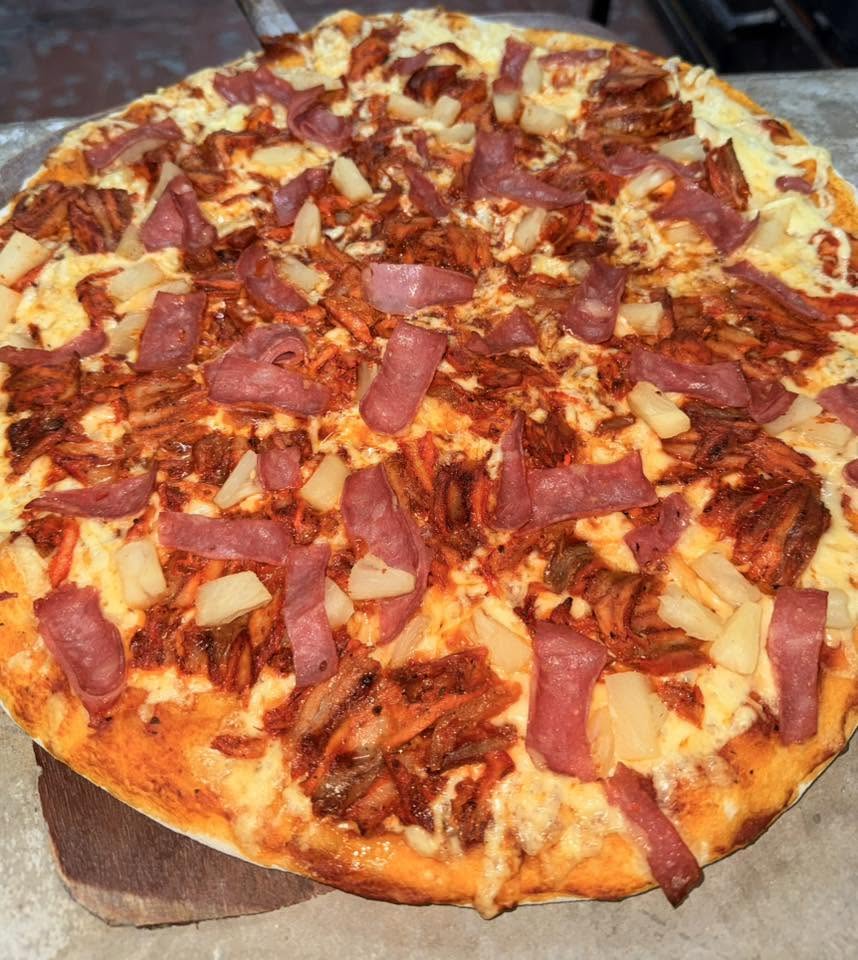 Taquería y Pizzería El Amigo Rach