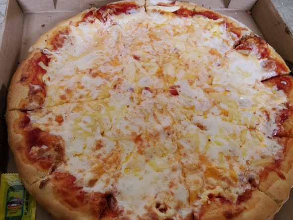 Manolo's Pizza