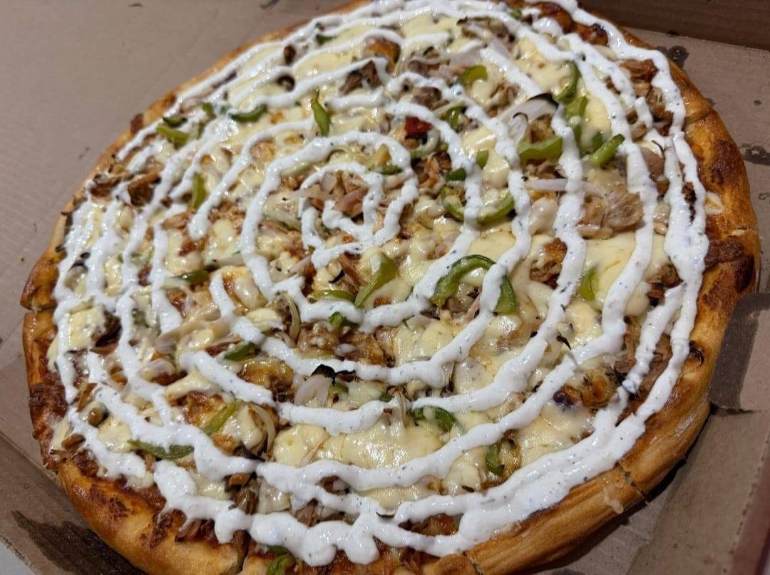 Pizzería El Tío Claudio - Pizzas y Promos