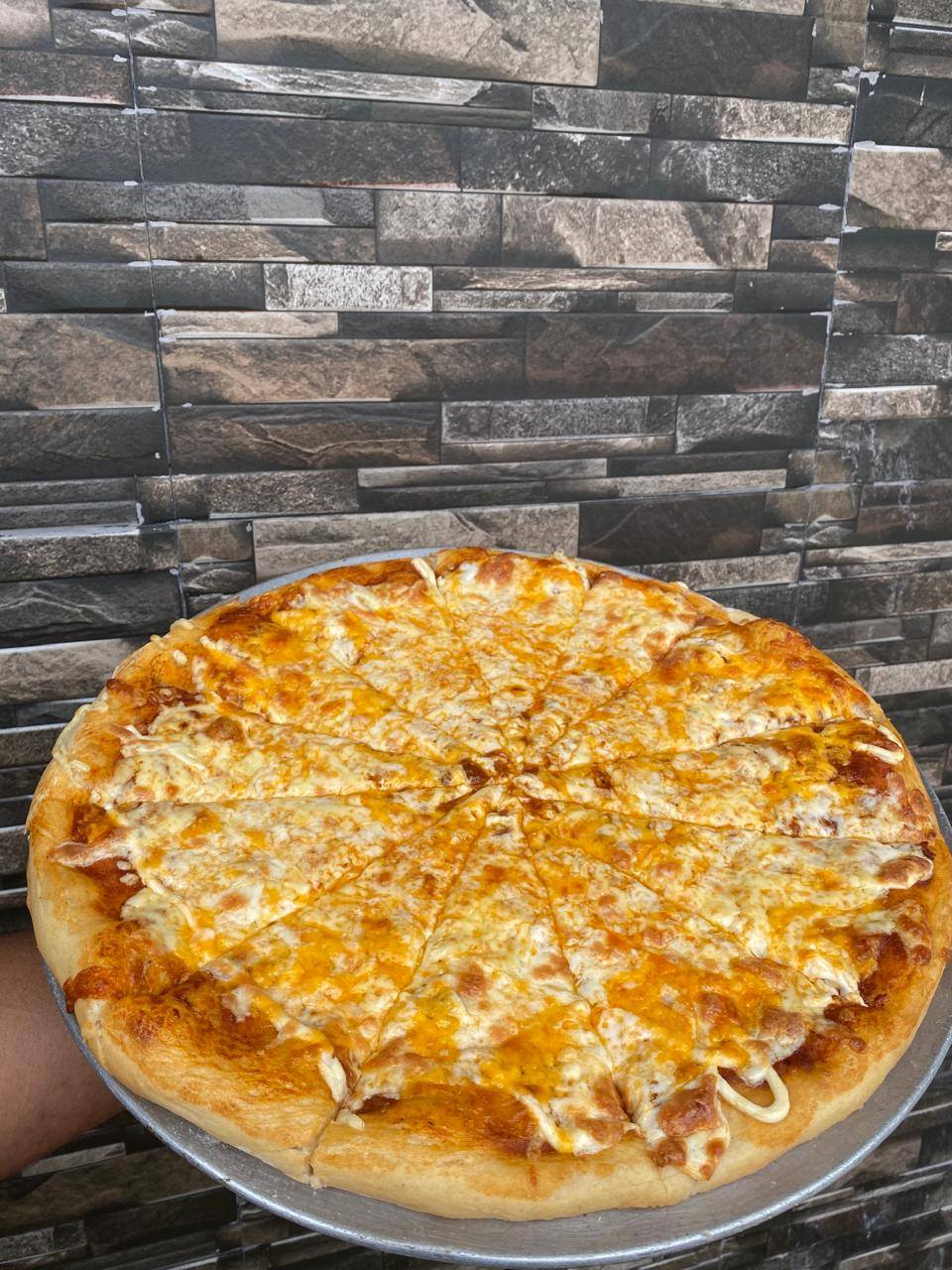Pizzería El Tío Claudio: Pizza artesanal para todos los gustos y presupuestos en Yucatán