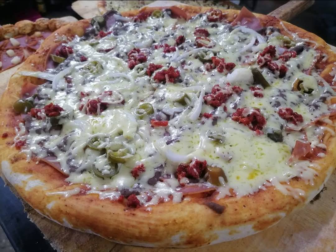 Pizzería Matute: Promoción de 1 Pizza con Queso Philadelphia